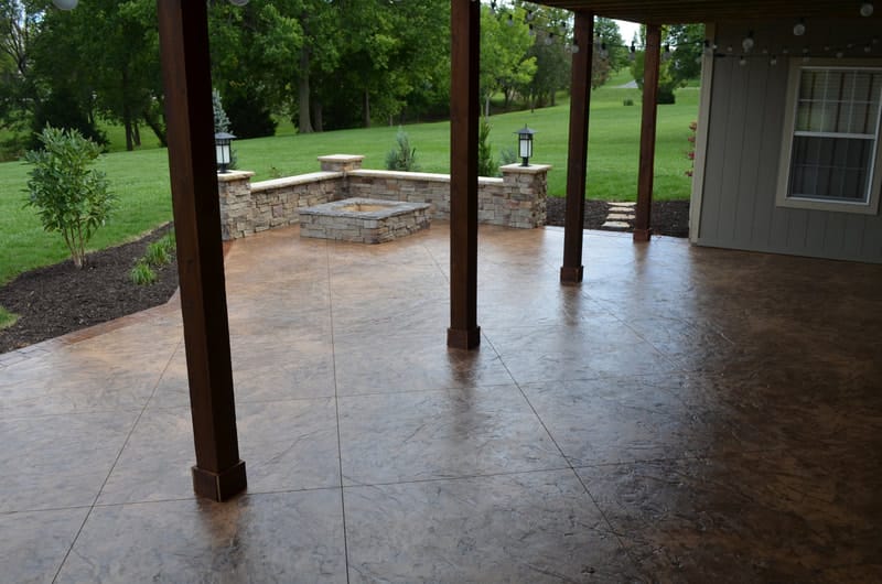 Stamped concrete patio under a covered porch