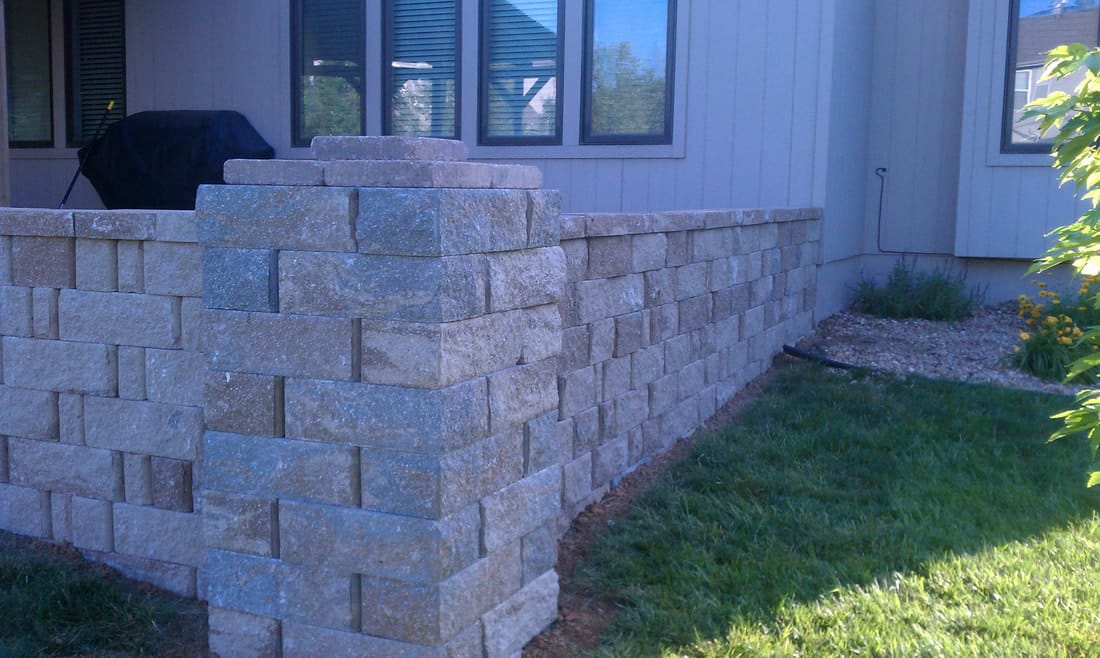 Stacked stone seating and retaining wall